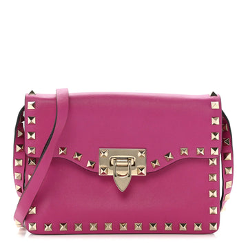 Vitello Small Rockstud Flip Lock Crossbody Bag Fuxia