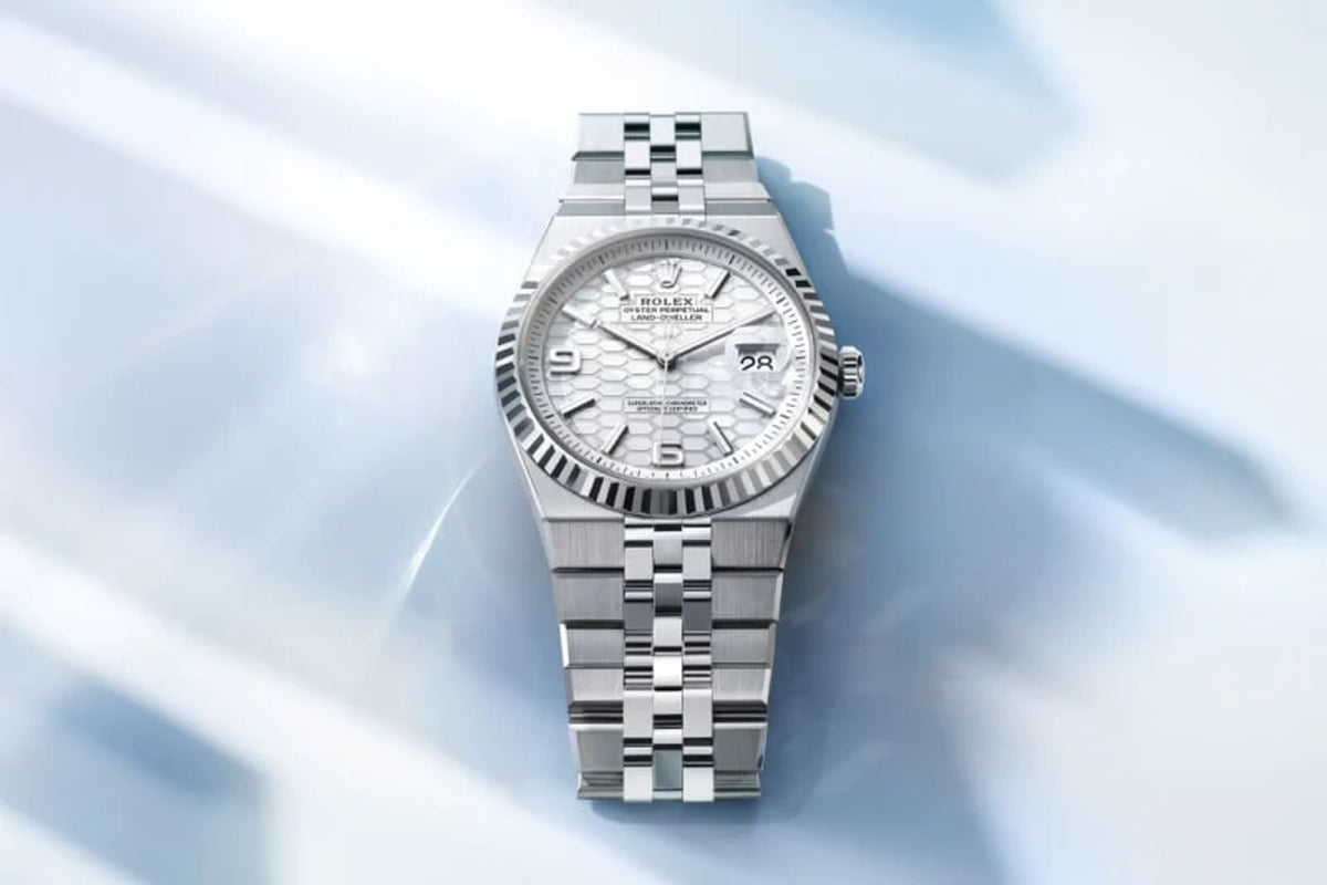 Unworn 2025,  Land-Dweller 40, Oystersteel and 18K White Gold, Intense White Dial, Fluted Flat Jubilee, Ref# 127334-0001, Box and Papers