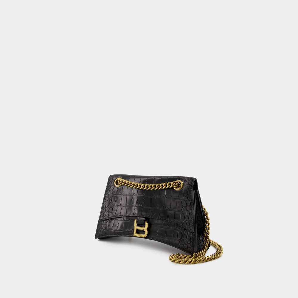 CRUSH CHAIN SMALL BAG in CROCODILE-EMBOSSED LEATHER. DIMENSIONS: L24.9 X H14 X W7.9 CM. 49.8 CM LONG CHAIN SHOULDER STRAP. CURVILINEAR BOTTOM. AGED GOLD FINISH. STUDDED MAGNET