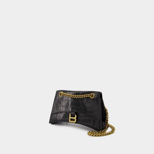 CRUSH CHAIN SMALL BAG in CROCODILE-EMBOSSED LEATHER. DIMENSIONS: L24.9 X H14 X W7.9 CM. 49.8 CM LONG CHAIN SHOULDER STRAP. CURVILINEAR BOTTOM. AGED GOLD FINISH. STUDDED MAGNET