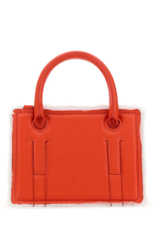 CORAL LEATHER MINI OTTO HANDBAG