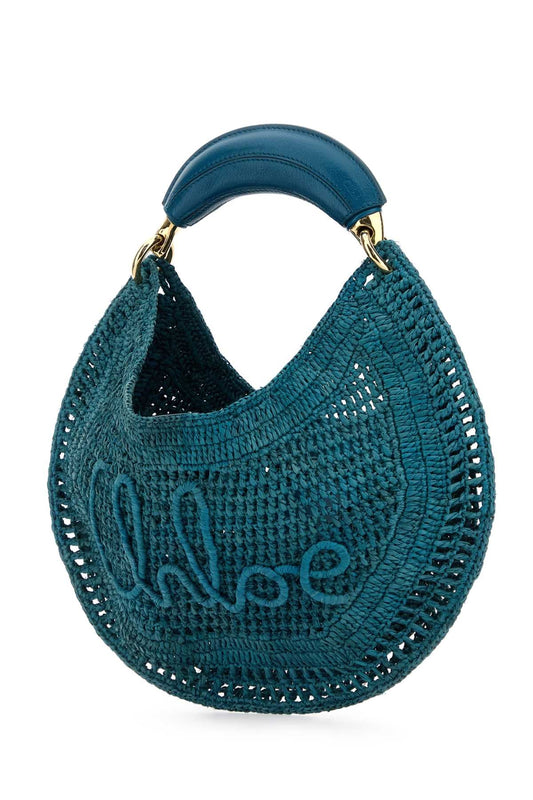 TEAL GREEN RAFFIA BANANA HANDBAG