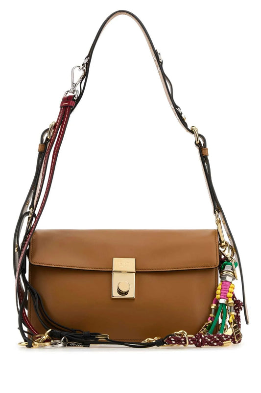 SOFT SOUND SMALL LEATHER SHOULDER BAG with CHARMS